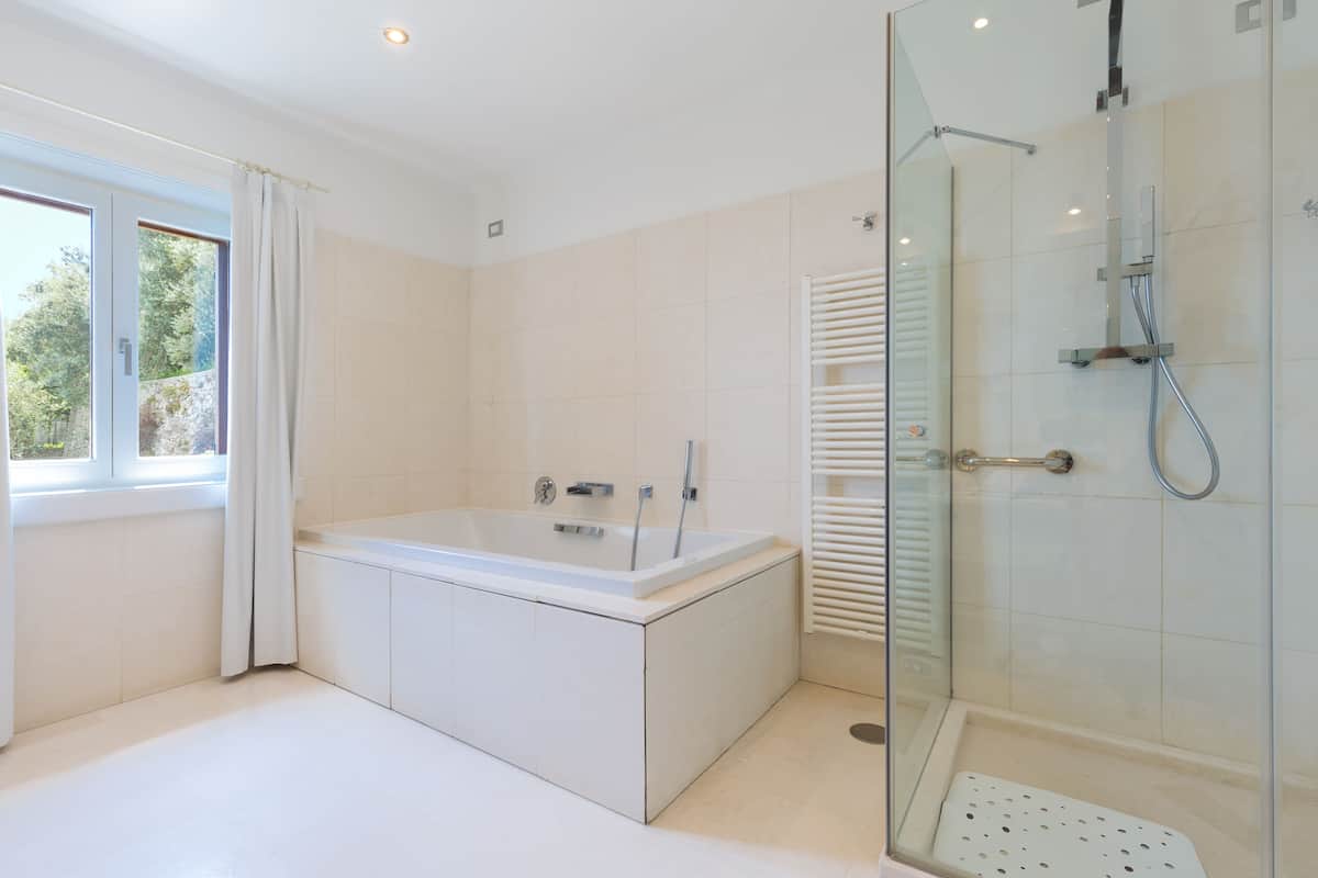deluxe suite | bathroom | free toiletries, hair dryer, bathrobes, slippers
