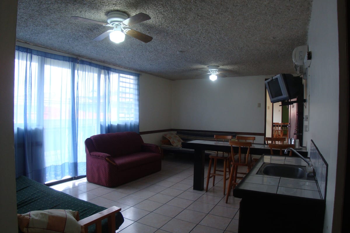 family suite, 2 bedrooms, city view | living area | 32-inch led tv with digital channels, tv