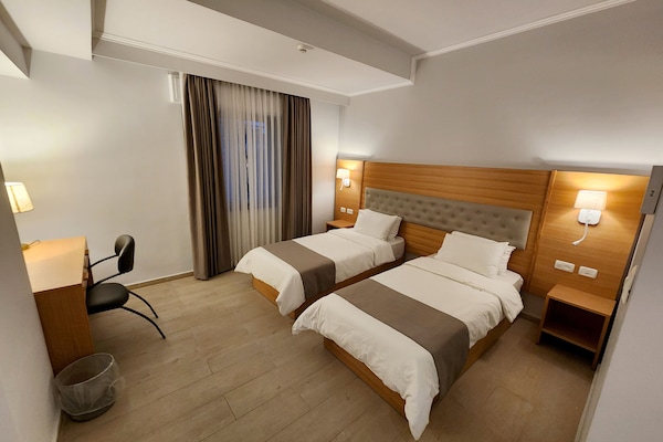 Comfort Twin Room | Hypo-allergenic bedding, in-room safe, desk, laptop workspace