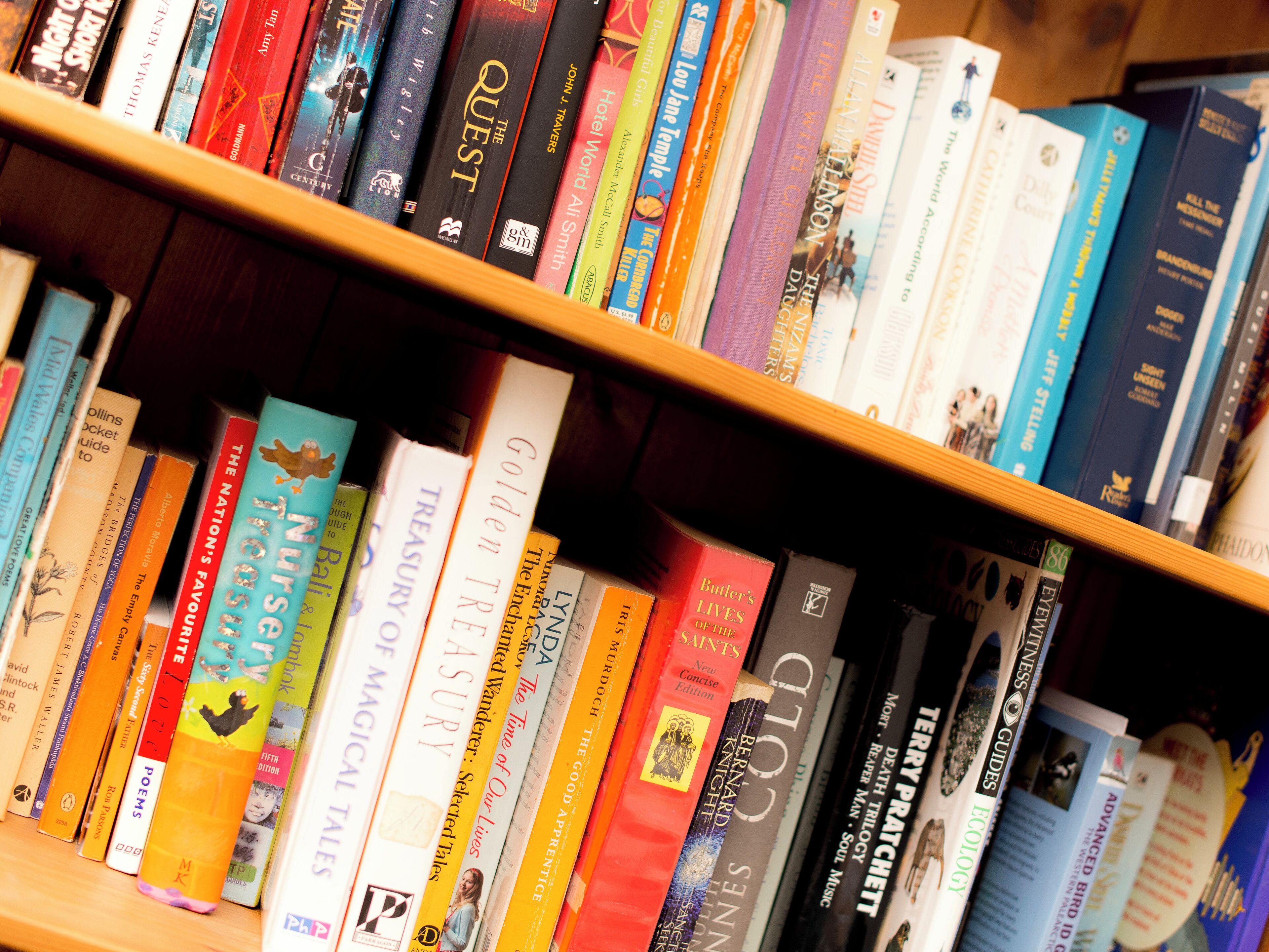 A bookshelf filled with various books.