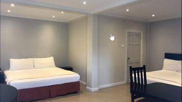 Family Room, 2 Queen Beds | Iron/ironing board, free WiFi, bed sheets