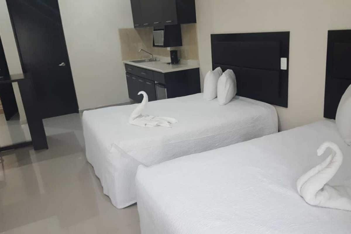 Appartamento Executive, 2 letti queen, microonde | 1 camera, ferro/asse da stiro, Wi-Fi gratuito, lenzuola