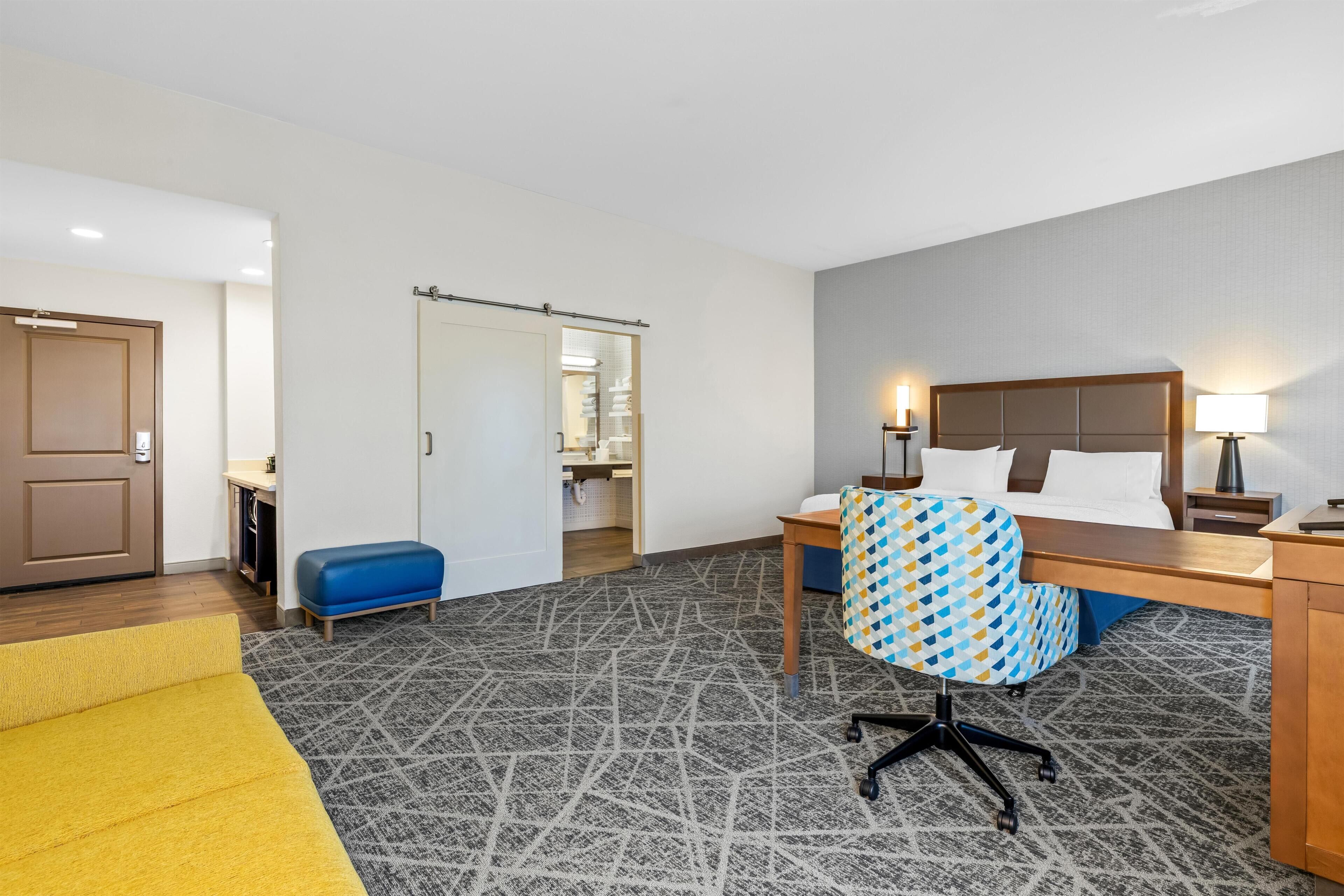 Studio, 1 King Bed, Accessible (Roll In Shower) | Minibar, in-room safe, iron/ironing board, free cribs/infant beds