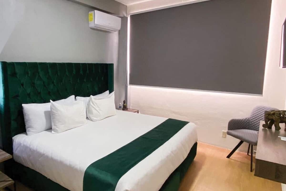 Deluxe Double Room, 1 Bedroom, Courtyard View | In-room safe, desk, laptop workspace, free WiFi