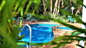 Outdoor pool, pool umbrellas, sun loungers