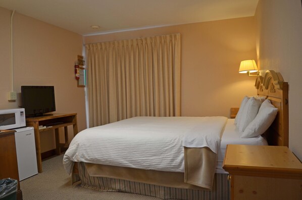 Standard-Einzelzimmer, 1 King-Bett, Nichtraucher | Individuell dekoriert, individuell eingerichtet, Schreibtisch