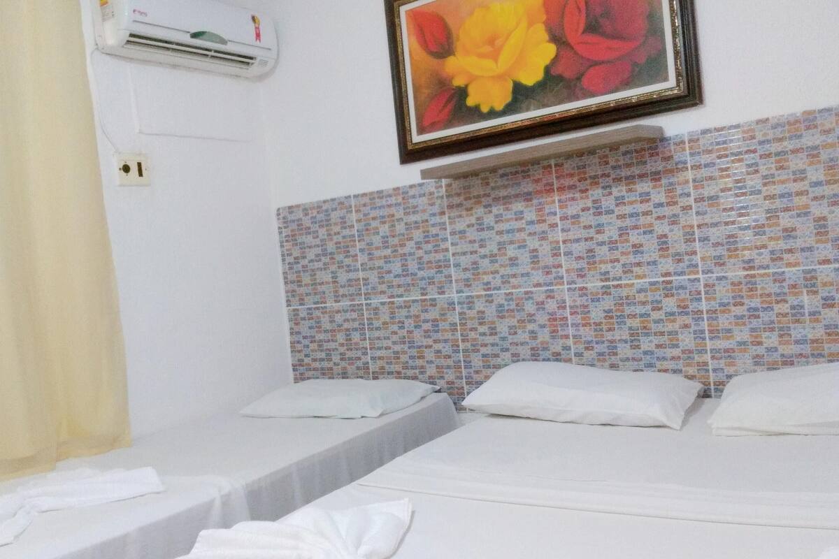 Standard Triple Room | Minibar, desk, blackout curtains, iron/ironing board