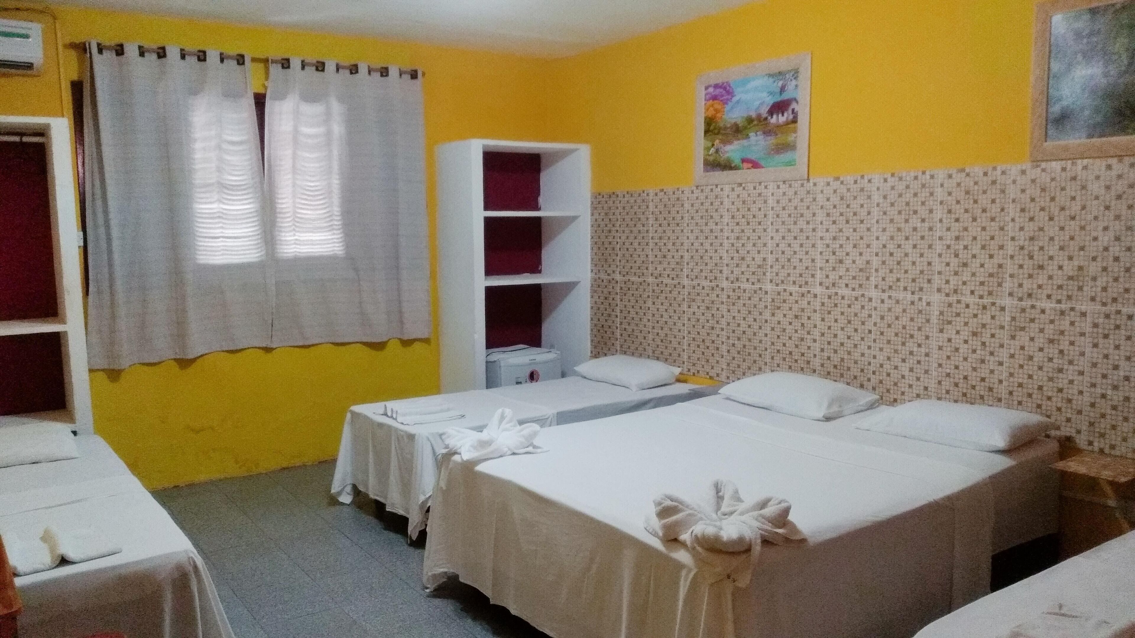 Family Room | Minibar, desk, blackout curtains, iron/ironing board