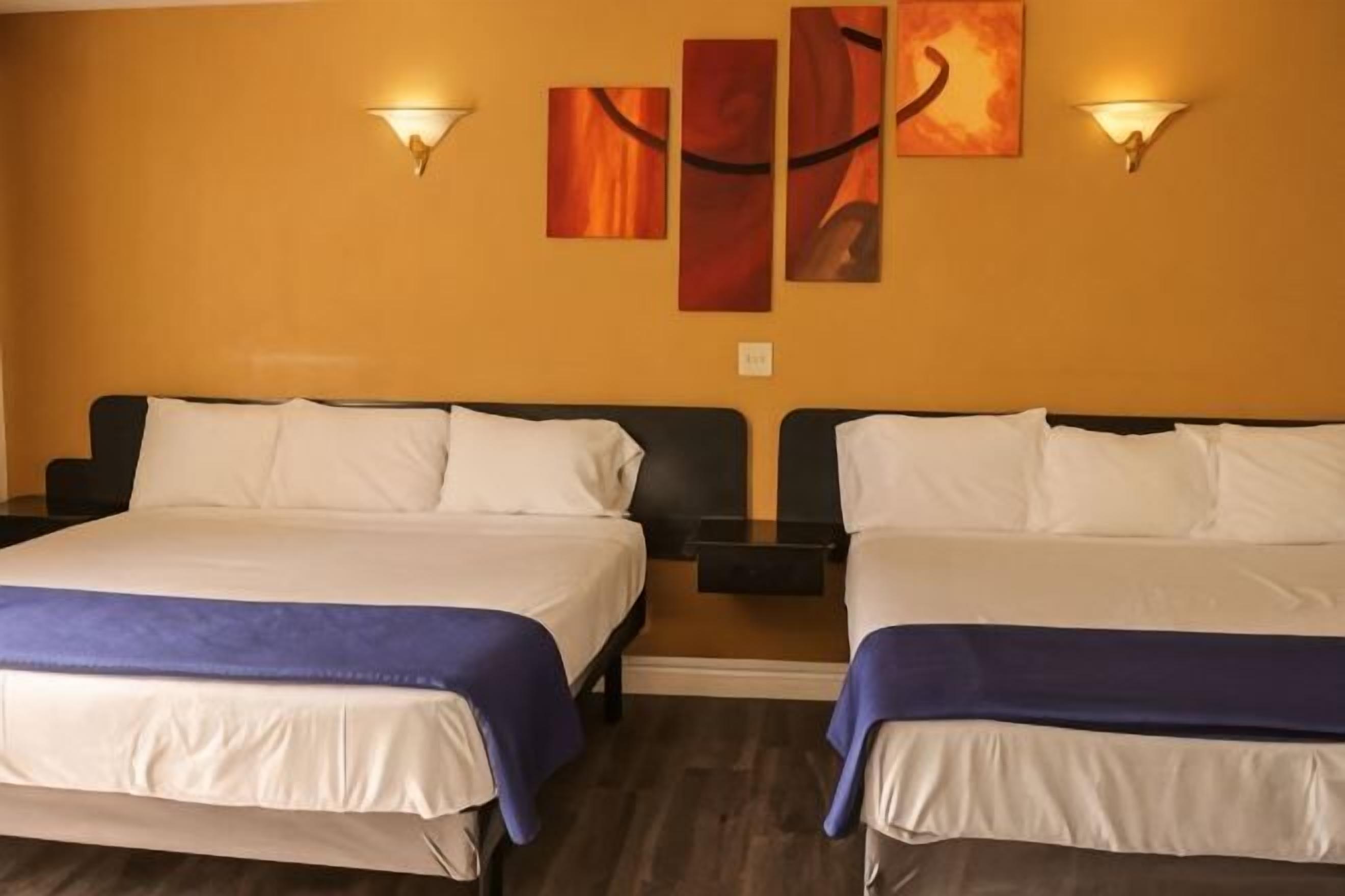 Desk, laptop workspace, blackout drapes, iron/ironing board