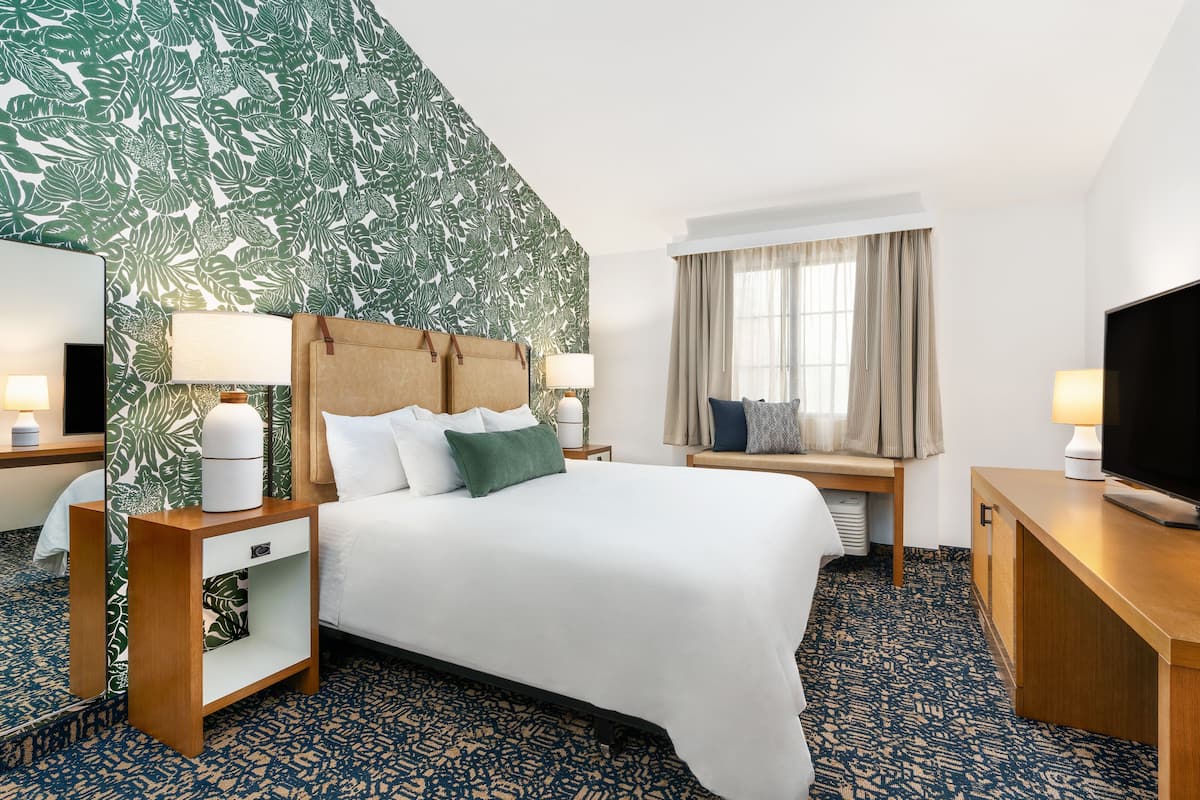 Luxe beddengoed, pillowtop-bedden, een minibar, een bureau