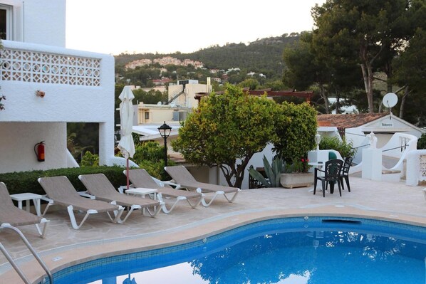 Outdoor pool, pool umbrellas, pool loungers