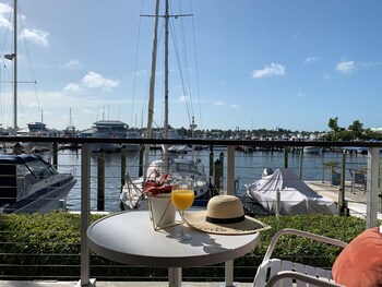 Premium bedding, in-room safe, individually decorated at Cove Inn on Naples Bay