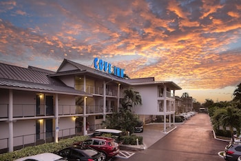Hotel exterior and entrance at Cove Inn on Naples Bay