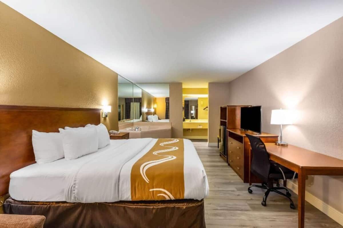 Premium bedding, pillowtop beds, desk, laptop workspace