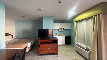 Minibar, iron/ironing board, WiFi (free), bed sheets