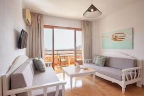 Standard-Apartment, 1 Schlafzimmer, Balkon | Zimmersafe, Schreibtisch, kostenlose Babybetten, kostenloses WLAN