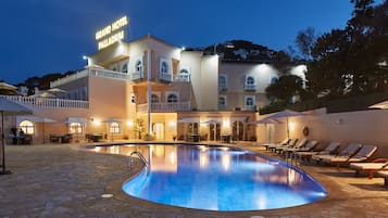 Indoor pool, seasonal outdoor pool, pool umbrellas, sun loungers