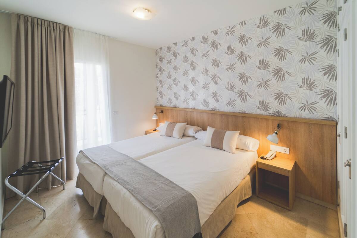 Blackout curtains, iron/ironing board, free WiFi, bed sheets