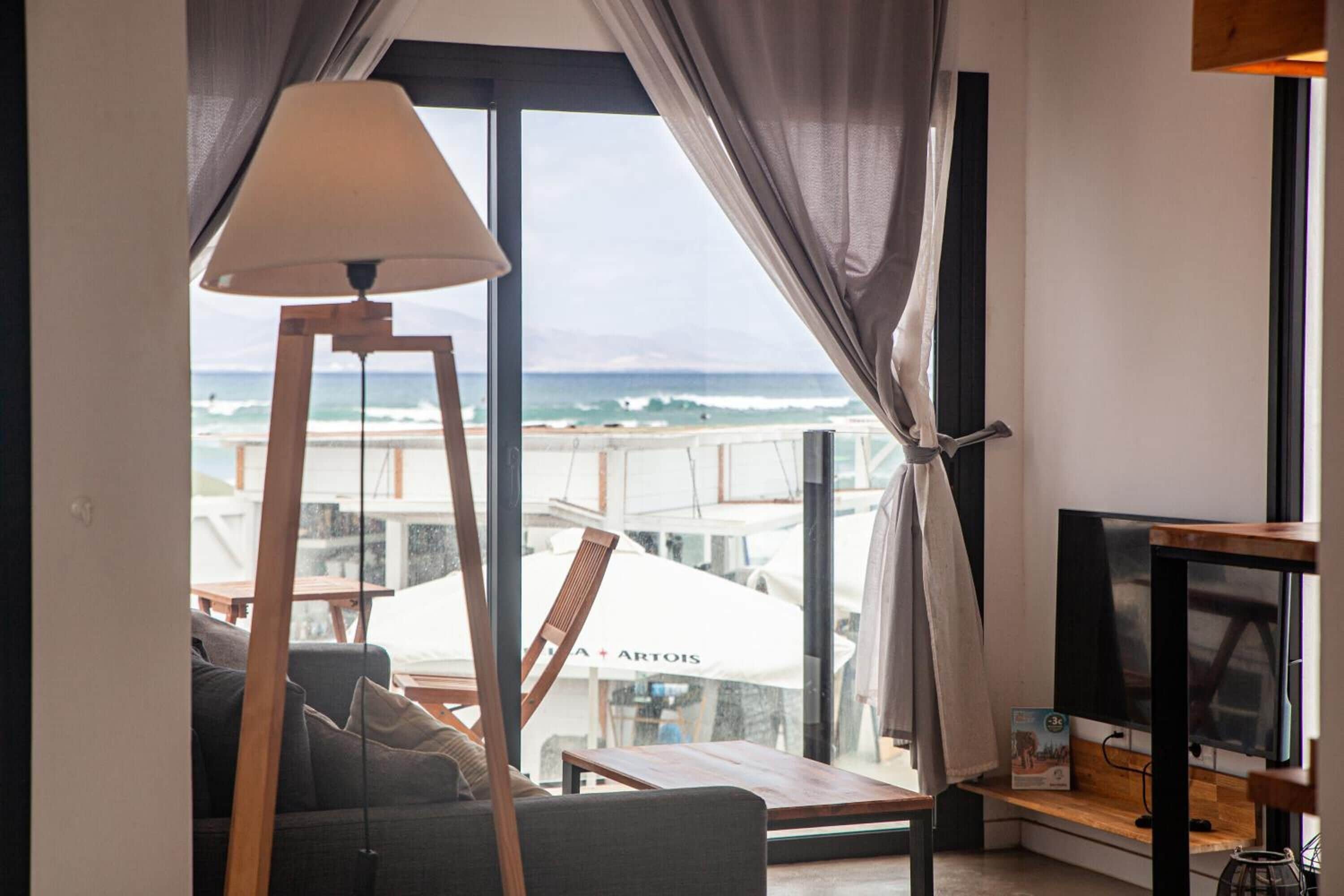 Premium Apartment, 1 Bedroom, Sea View | Living room | Flat-screen TV