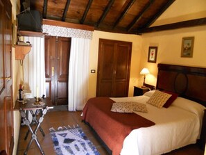 Blackout drapes, iron/ironing board, free cribs/infant beds