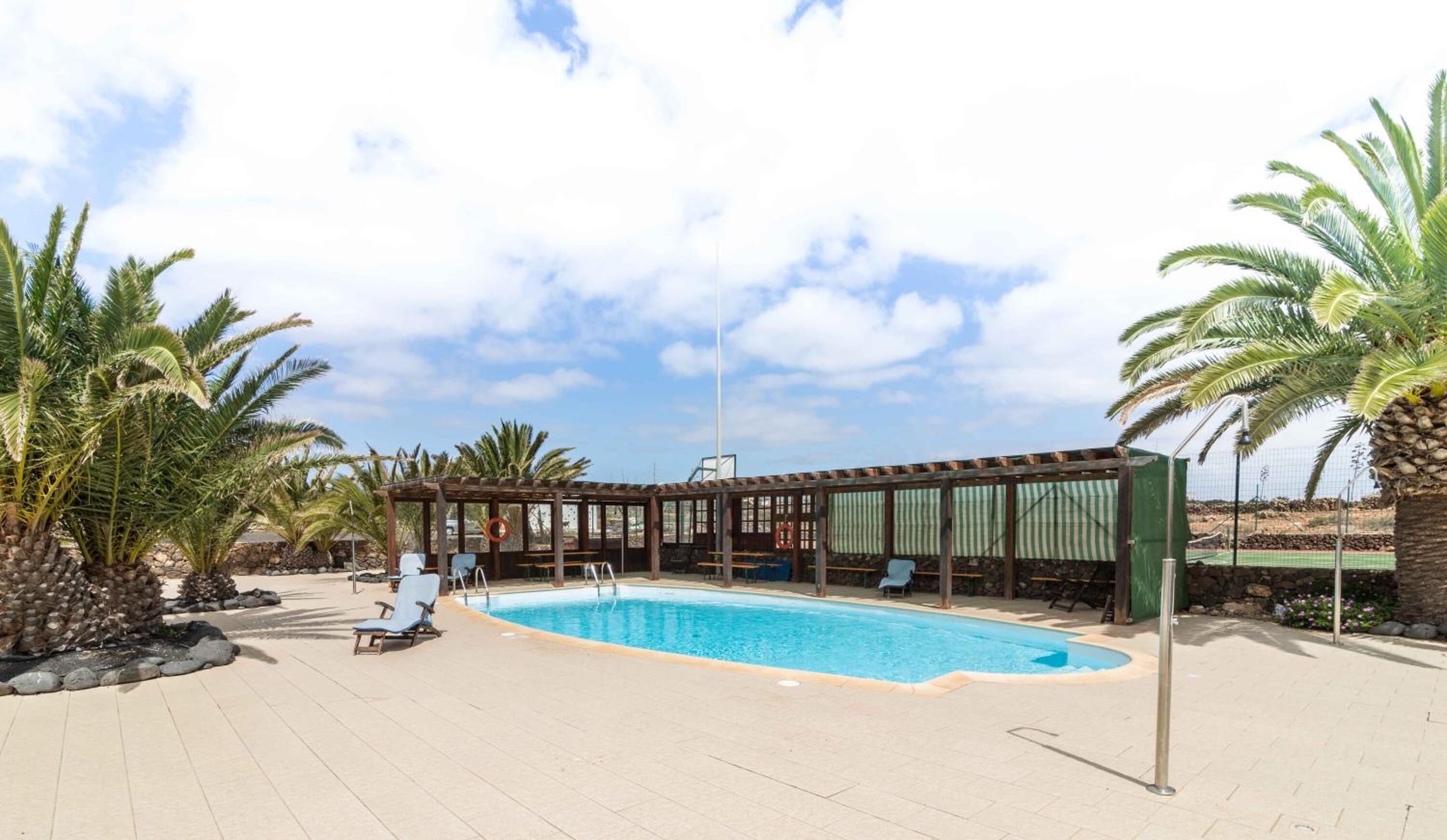 indoor pool, open 8:00 am to 8:00 pm, pool loungers