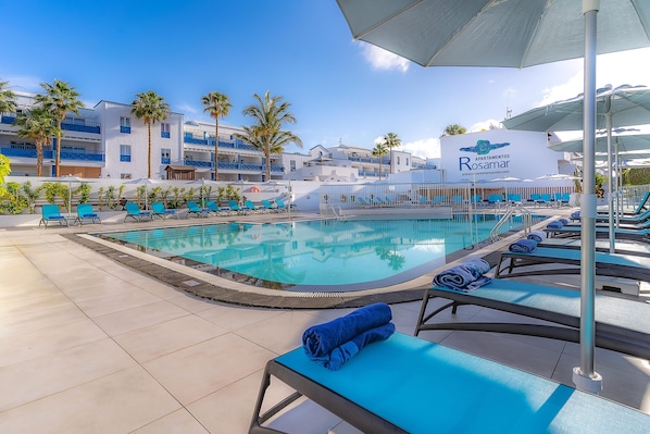 Outdoor pool, pool umbrellas, pool loungers