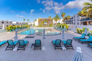 Outdoor pool, pool umbrellas, sun loungers