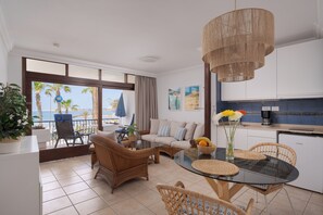 Departamento, 1 habitación (Balcony or Terrace) | Área de sala de estar | Televisión de pantalla plana de 50 pulgadas con canales digitales