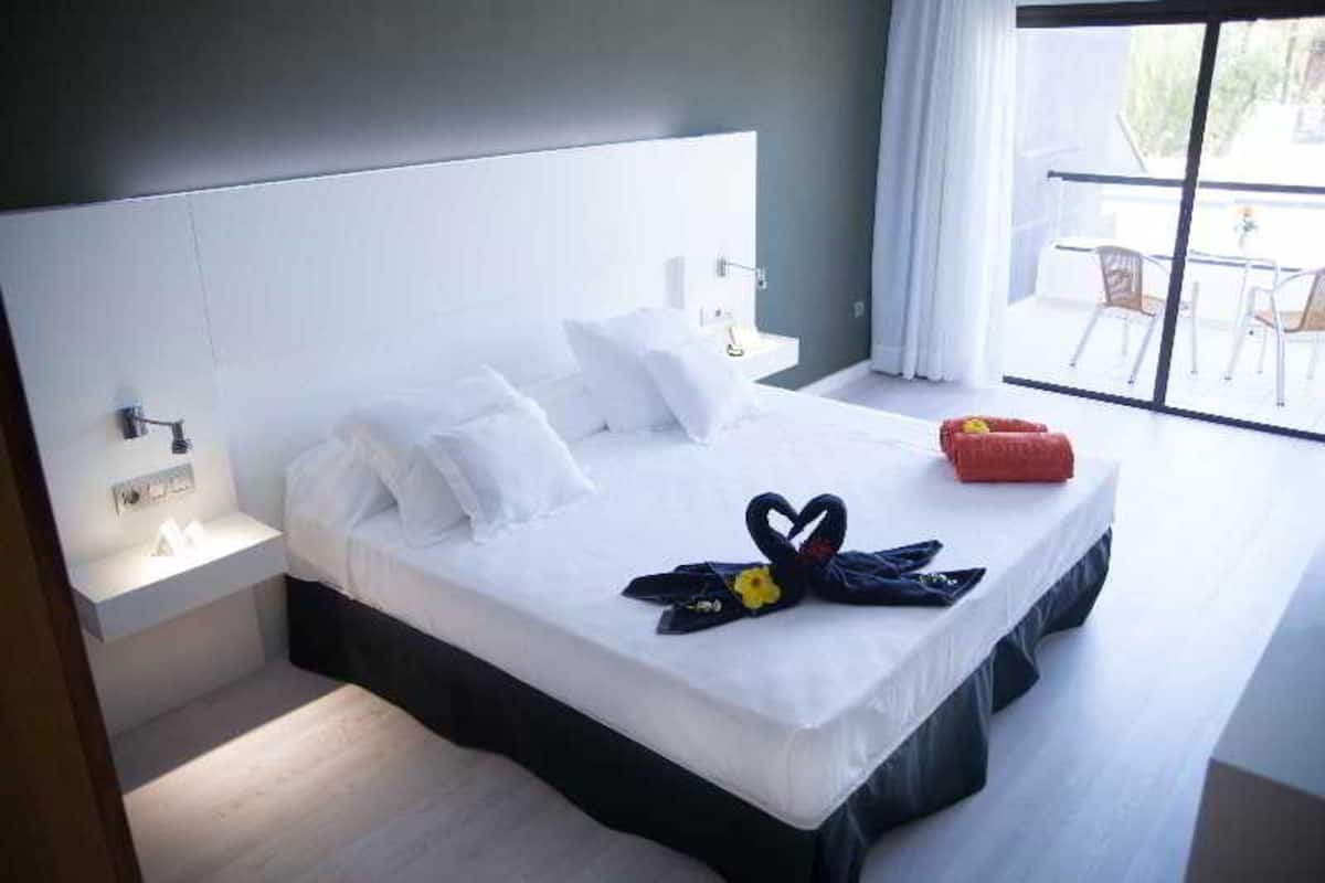 In-room safe, desk, blackout curtains, iron/ironing board (on request)