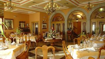 Breakfast, lunch, dinner served; local cuisine