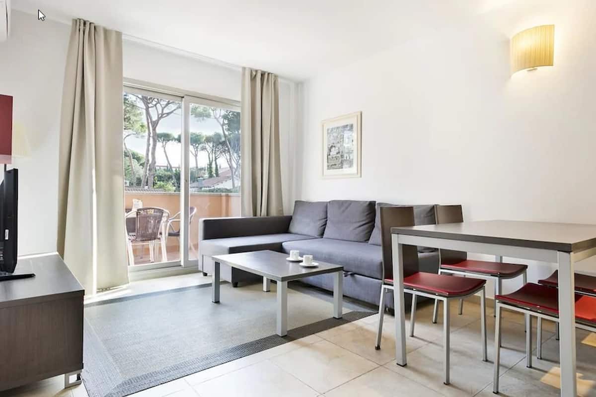 Superior Apartment, 1 Bedroom | Living area | 27-inch flat-screen TV with satellite channels, TV
