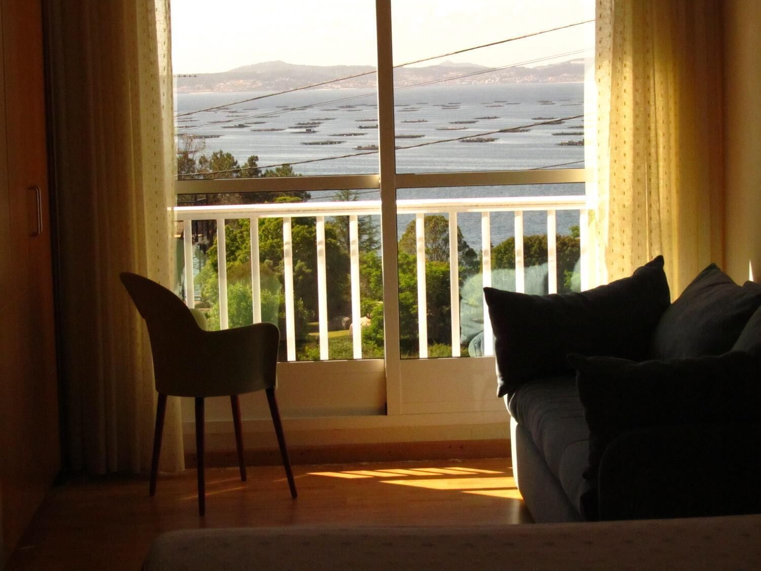 double room, beach view | living room | flat-screen tv