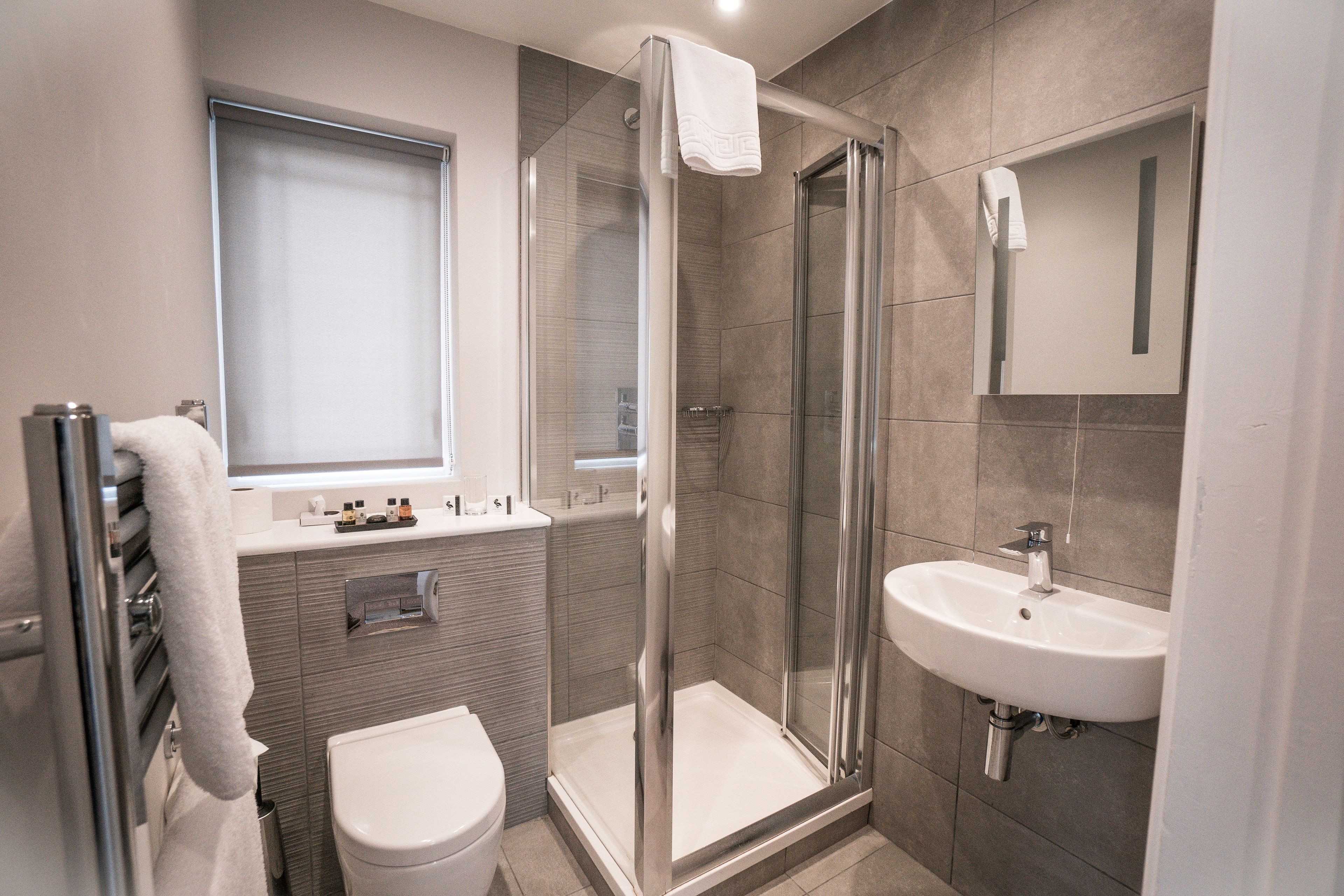 superior double room | bathroom | free toiletries, hair dryer, towels