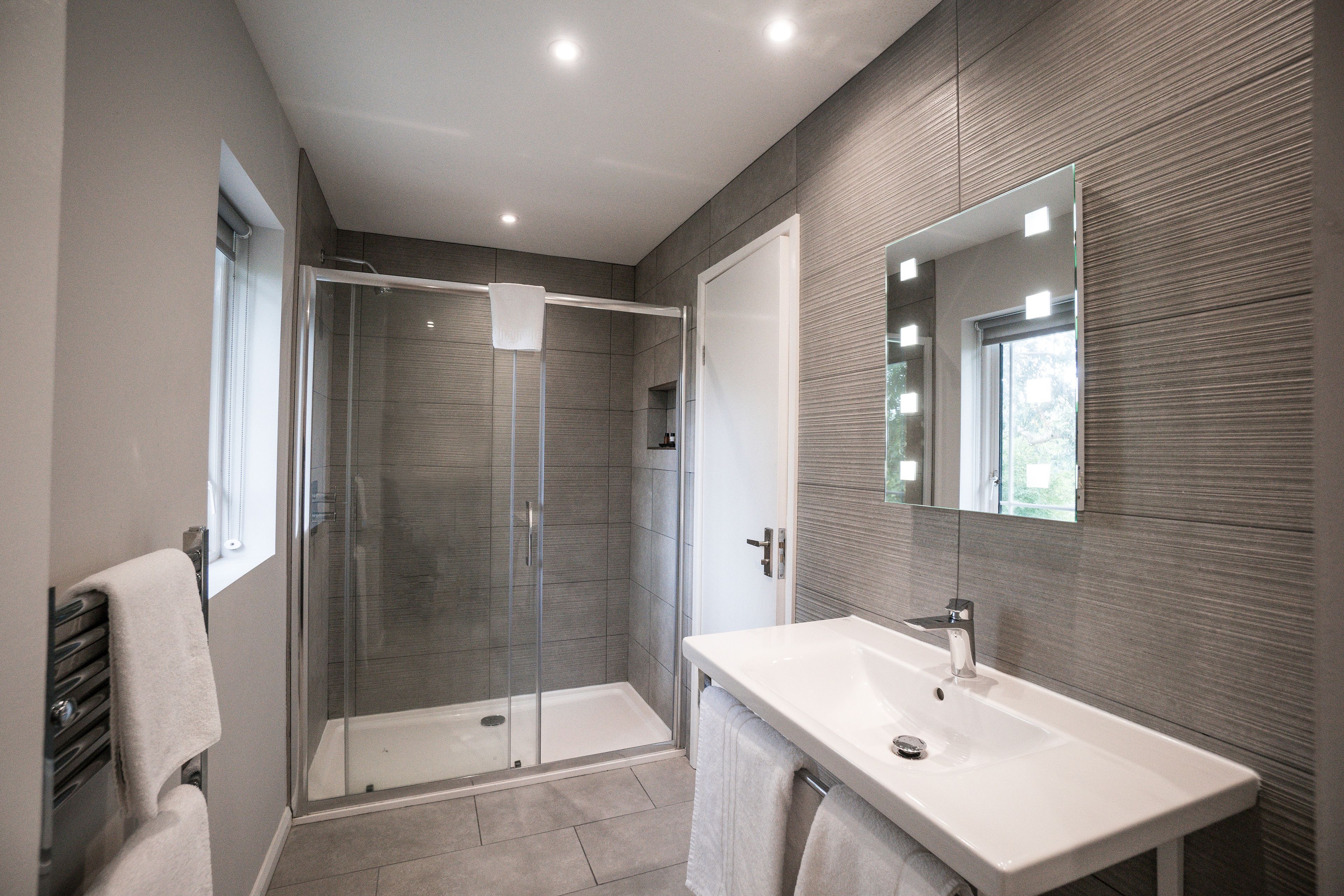 superior double room | bathroom | free toiletries, hair dryer, towels