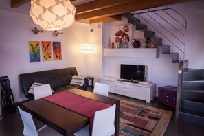 Apartment, 2 Bedrooms (up to 6 people) | Living area | 24-inch LED TV with satellite channels, TV, pay movies