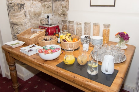 Breakfast area. The Abbey Hotel and Apartments