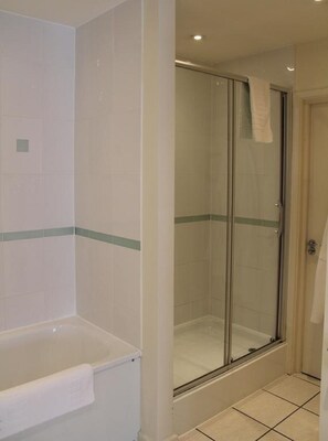 Combined shower/tub, free toiletries, hair dryer, bathrobes