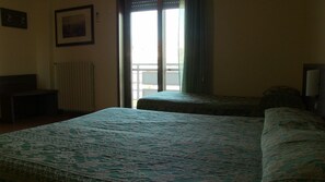 Standard Quadruple Room, Multiple Beds | Down comforters, minibar, in-room safe, desk - Hotel Due Pini (Melfi)