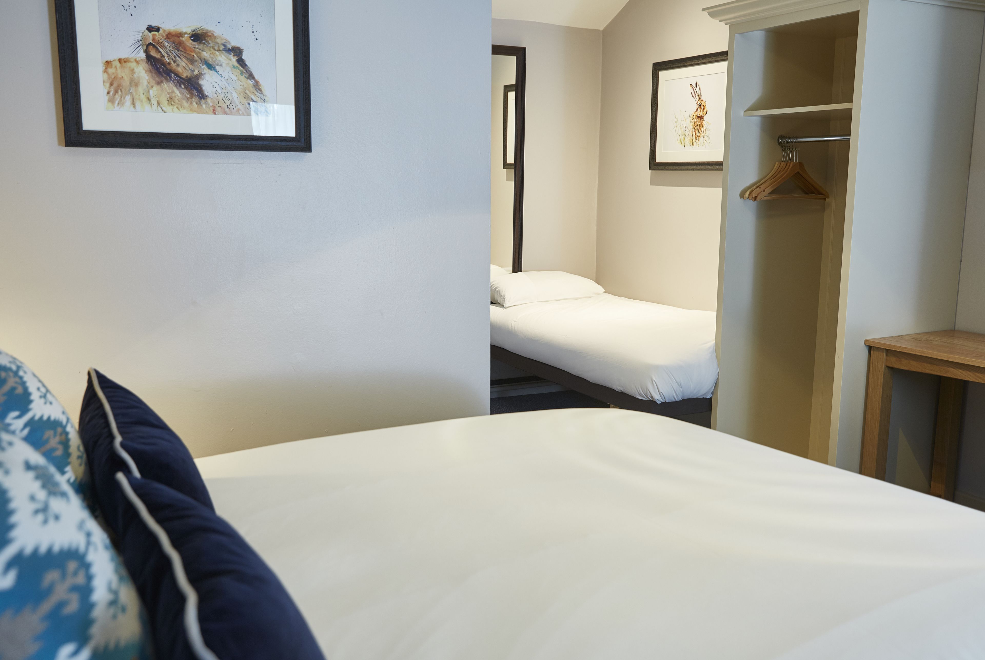 family room, multiple beds | desk, iron/ironing board, free wifi, bed sheets