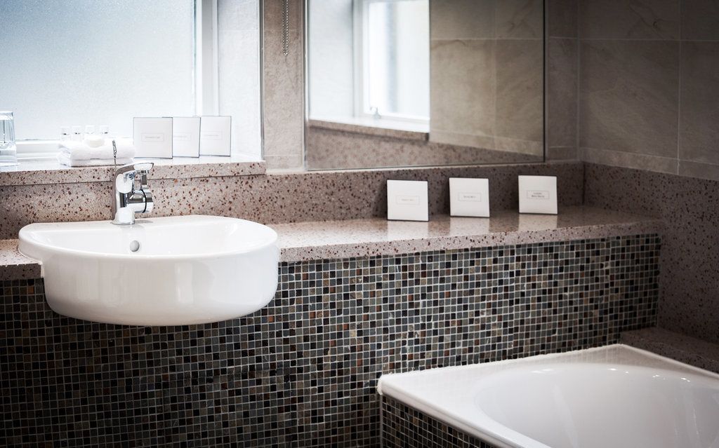 cottage | bathroom | designer toiletries, hair dryer, towels