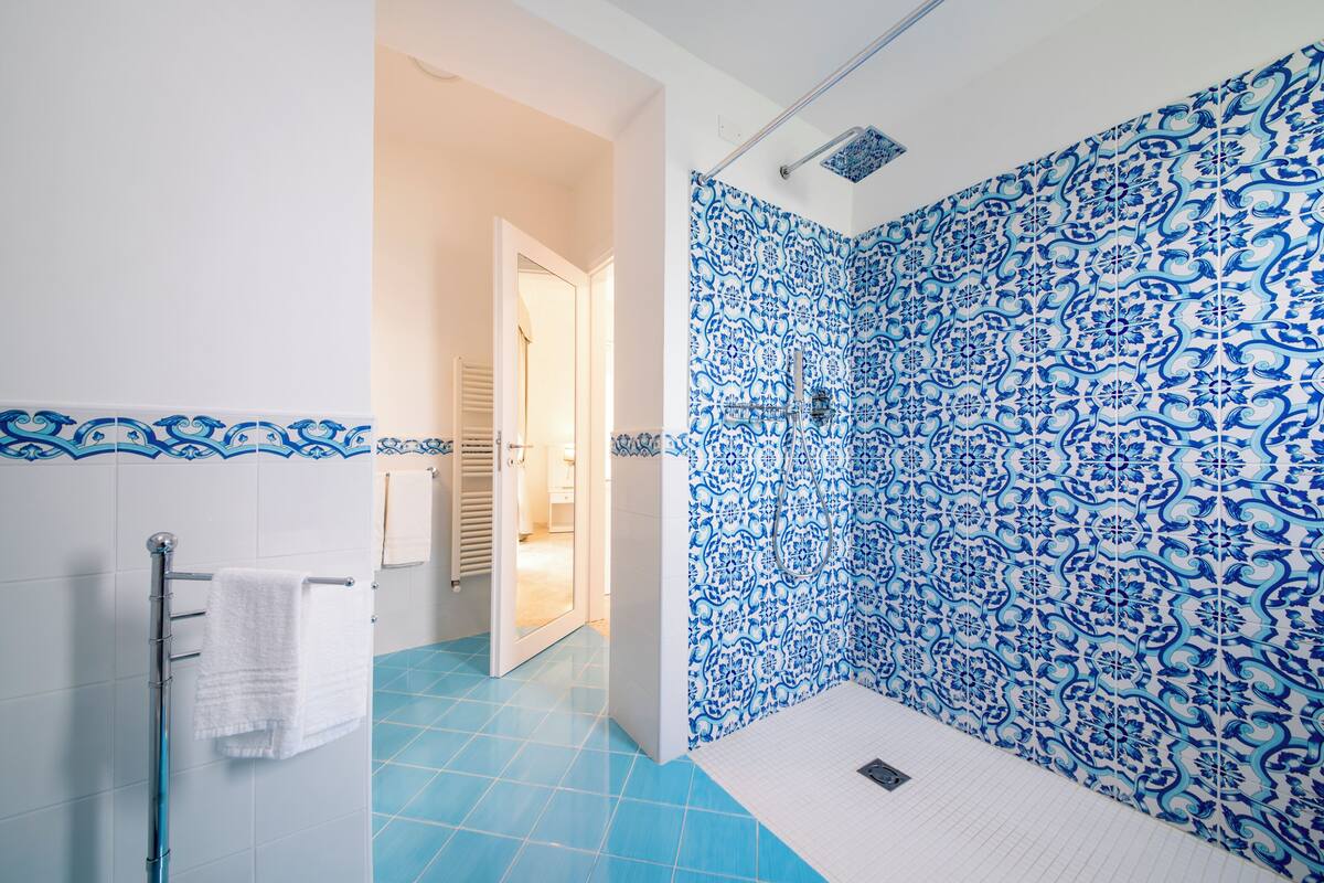 shower, free toiletries, hair dryer, bathrobes