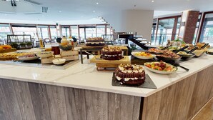 A buffet with various desserts and food items. - CIM Business Centre (Maidenhead)