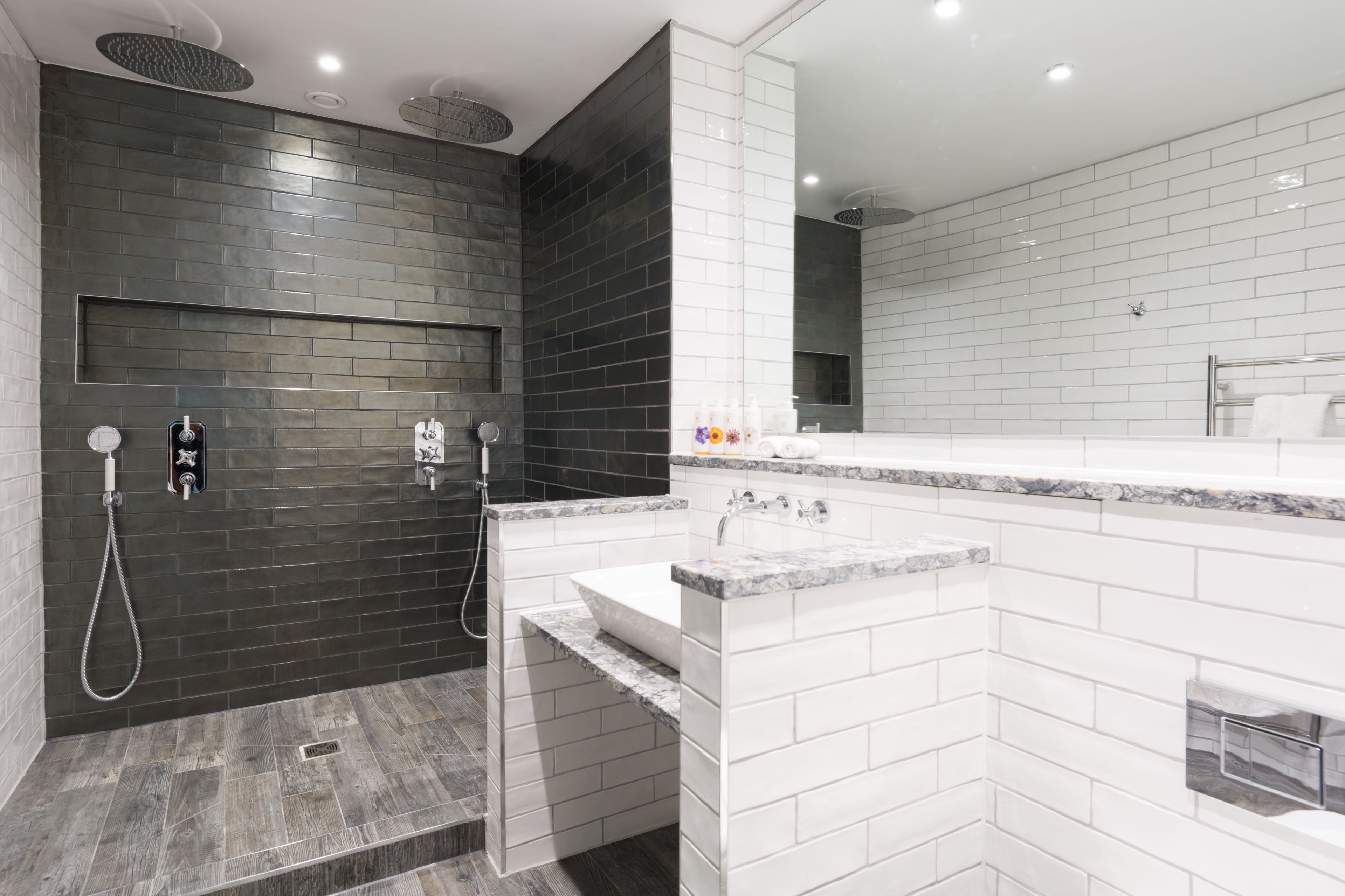 luxury suite, 1 queen bed, garden view | bathroom | free toiletries, hair dryer, towels