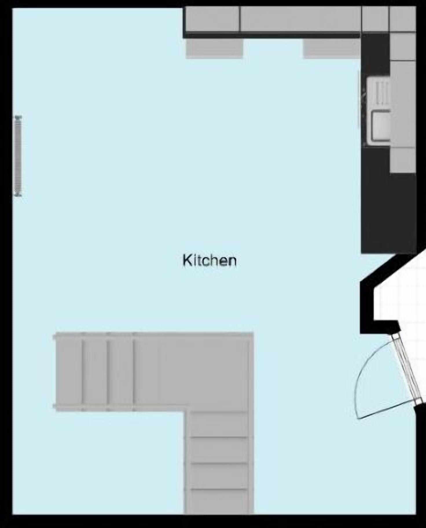 A floor plan with a kitchen area, a dining area, and a bathroom.