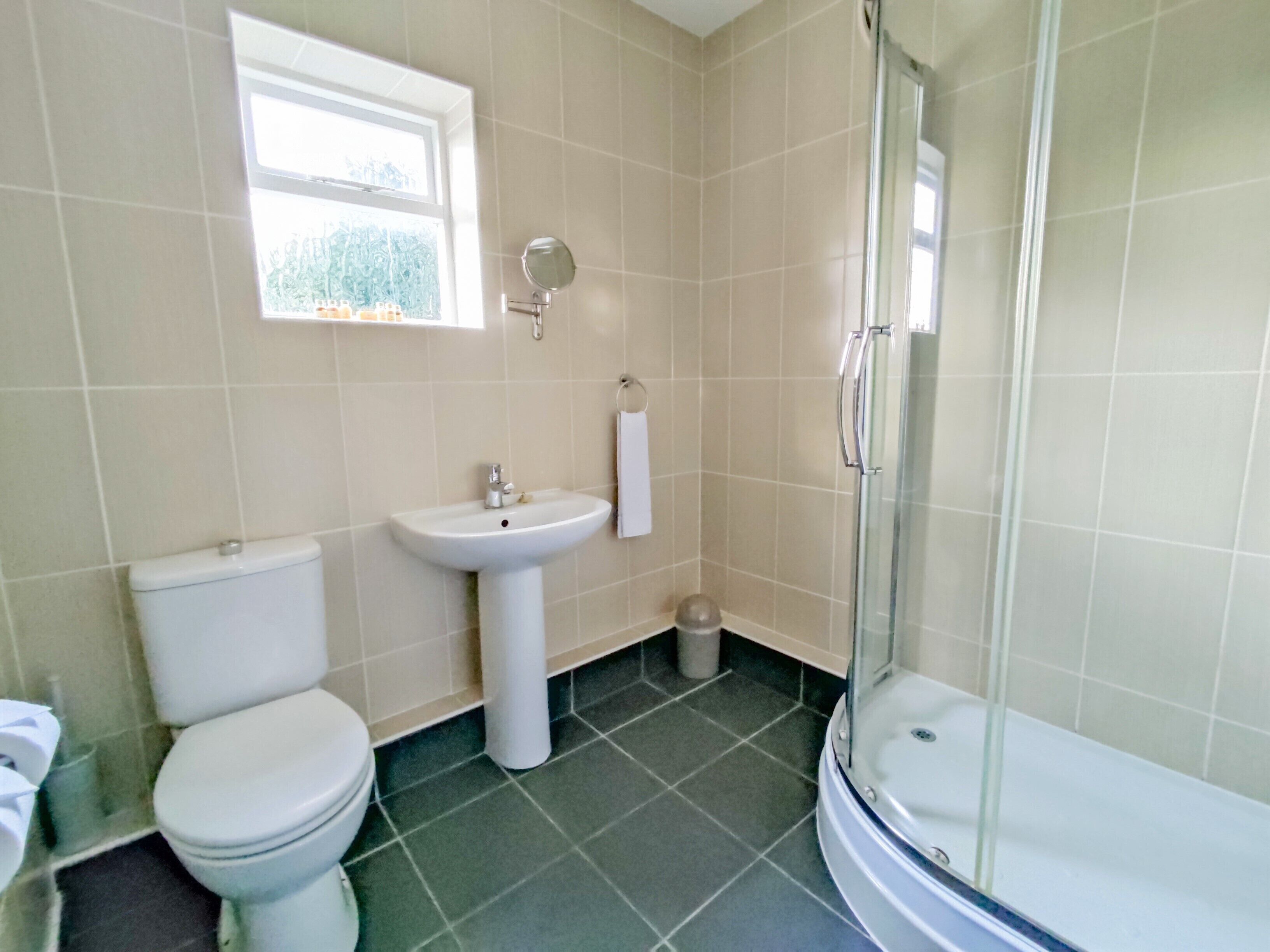 standard double room | bathroom | hair dryer, towels
