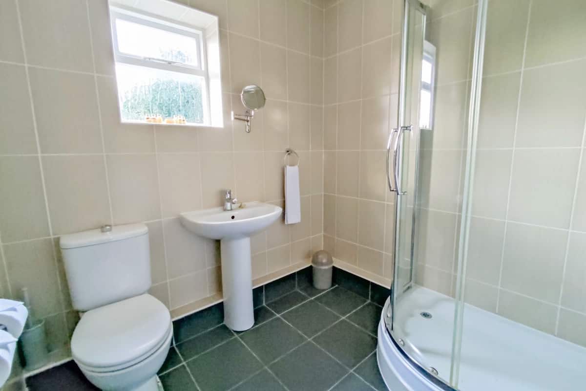 standard double room | bathroom | hair dryer, towels