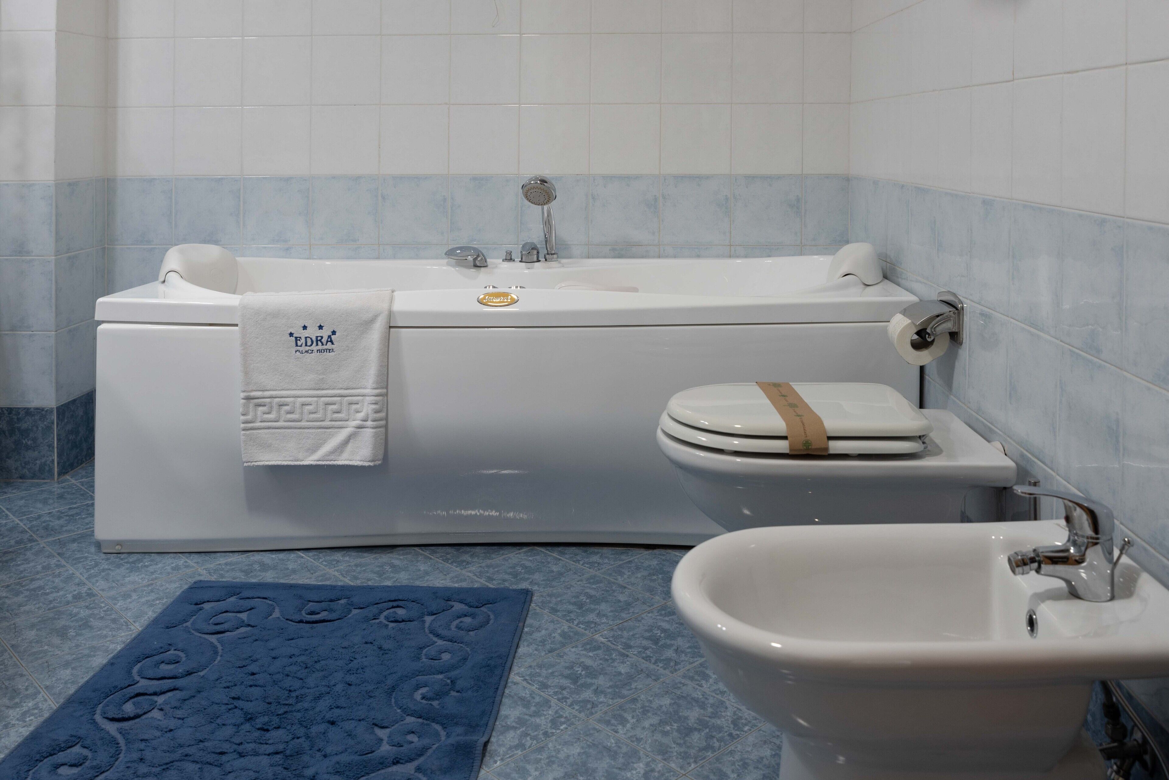 suite, garden view | bathroom | free toiletries, hair dryer, slippers, bidet