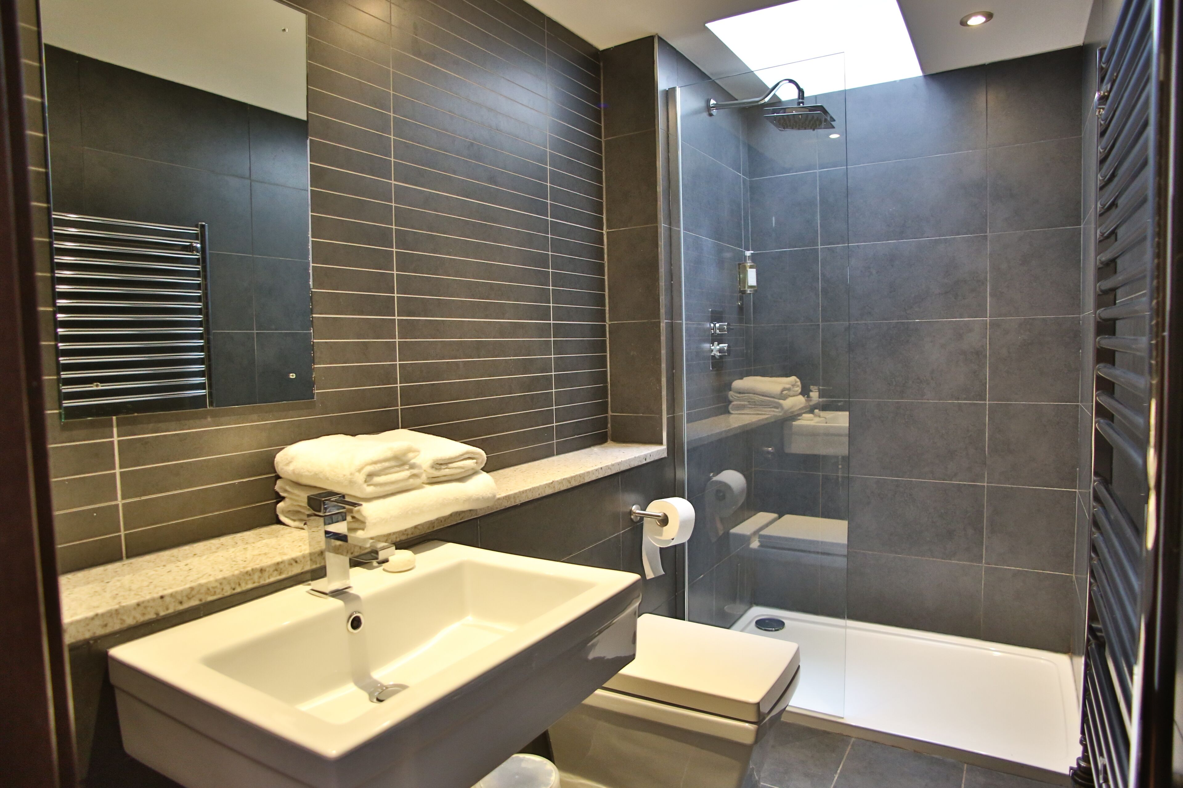 Shower, free toiletries, hair dryer, towels