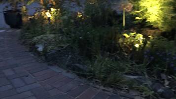 A paved pathway with a brick pattern.