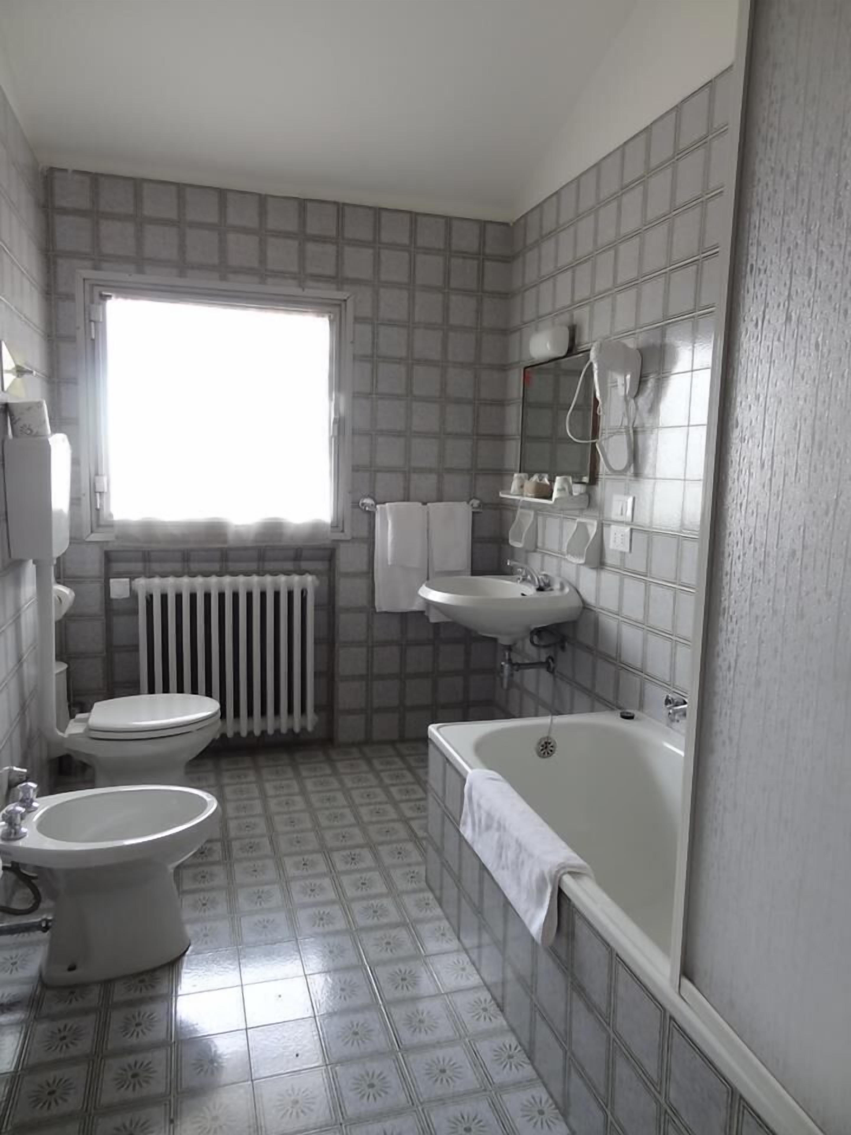 free toiletries, hair dryer, bidet, towels